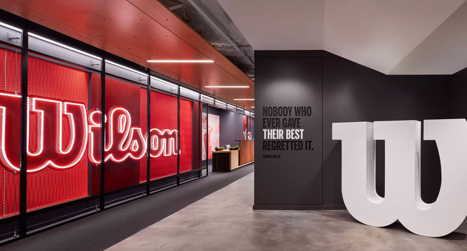 Wilson branded feature in hallway at One Two Pru