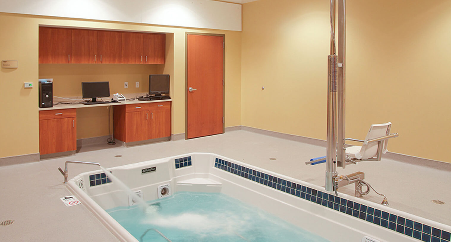 Physical therapy room with hot tub at Loyola Medical Center